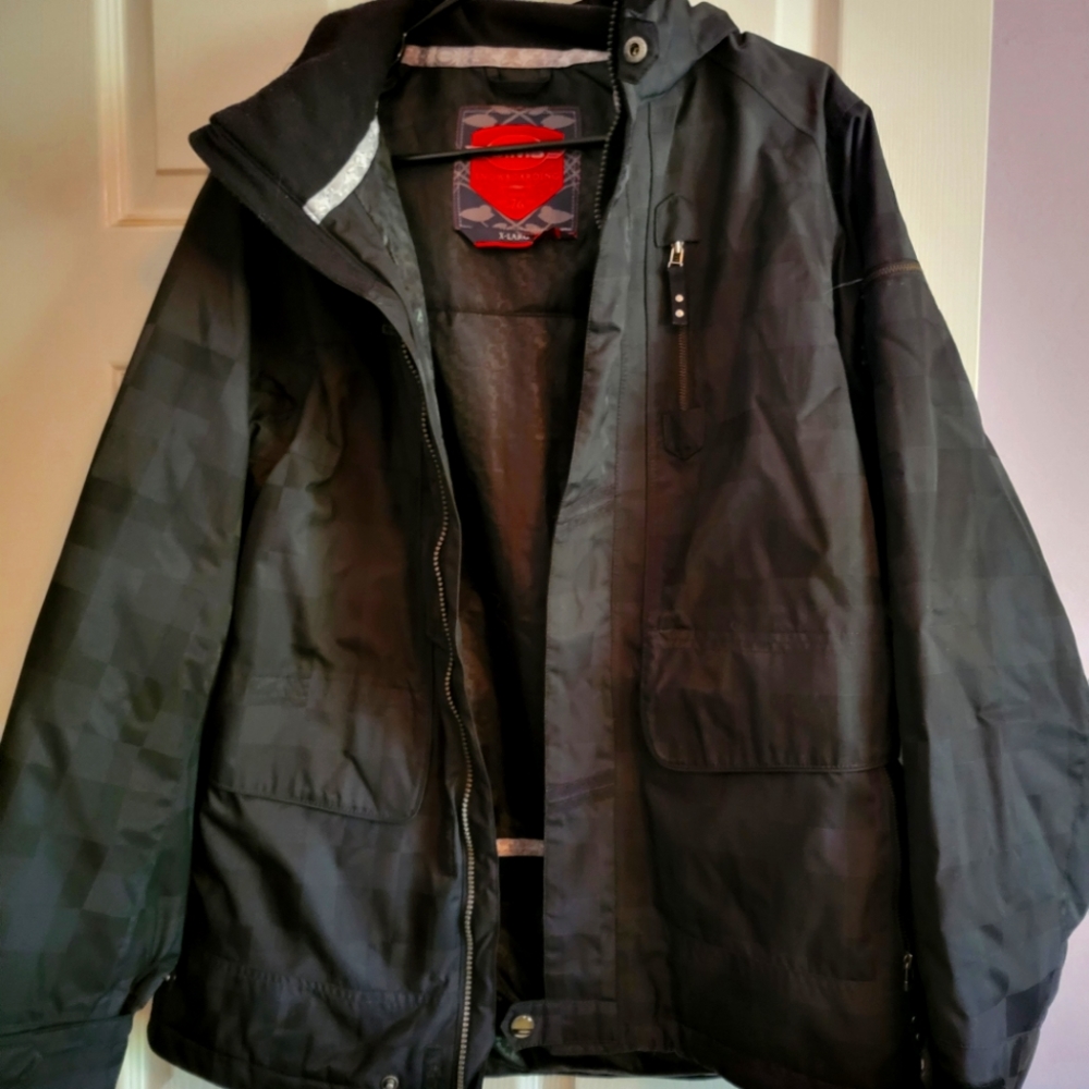 Sims size XL black snowboarding jacket. In perfect condition.